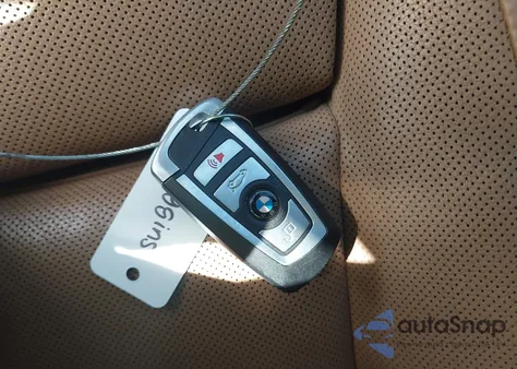 2015 BMW 750Li z USA, uszkodzony, nr VIN WBAYE8C55FD782482